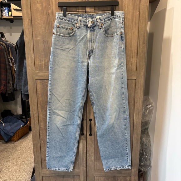VTG Levi’s 550 2002 Jeans Light Wash Relaxed Fit Grunge Denim 33x30 - Picture 1 of 13